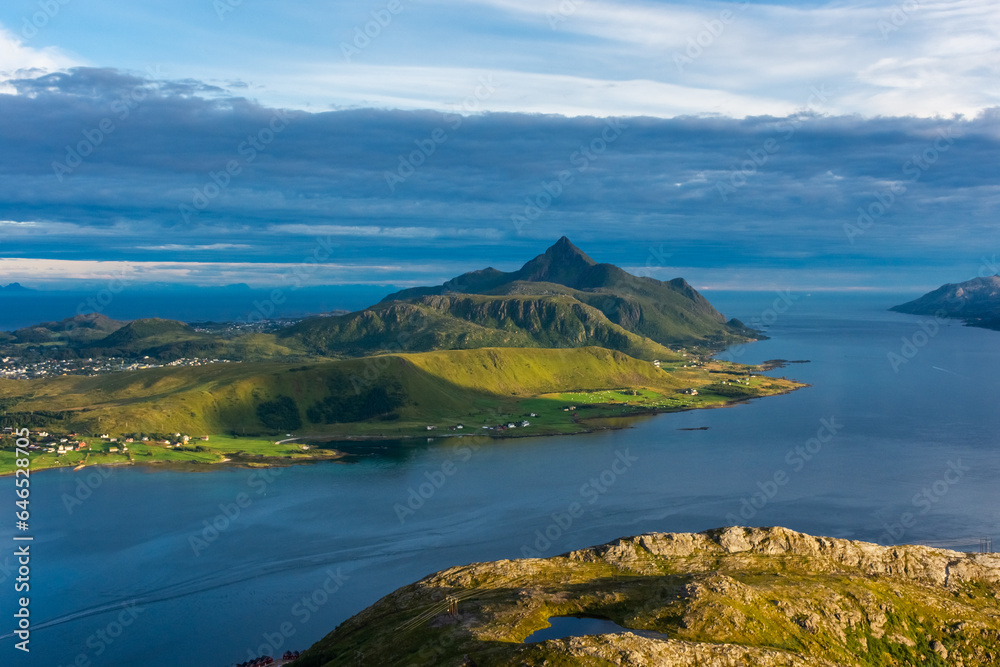 Naklejka premium Beautiful landscape of the Lofoten Islands during the golden hour, view from Offersoy Mount trail, Norway