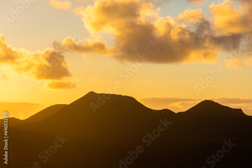 Beautiful silhouette of Lanzarote volcanos at sunset, Canary Islands, Spain
