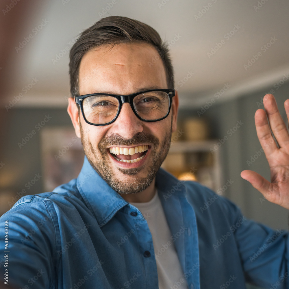 One adult man with eyeglasses stand at home happy smile One adult man with eyeglasses stand at home happy smile