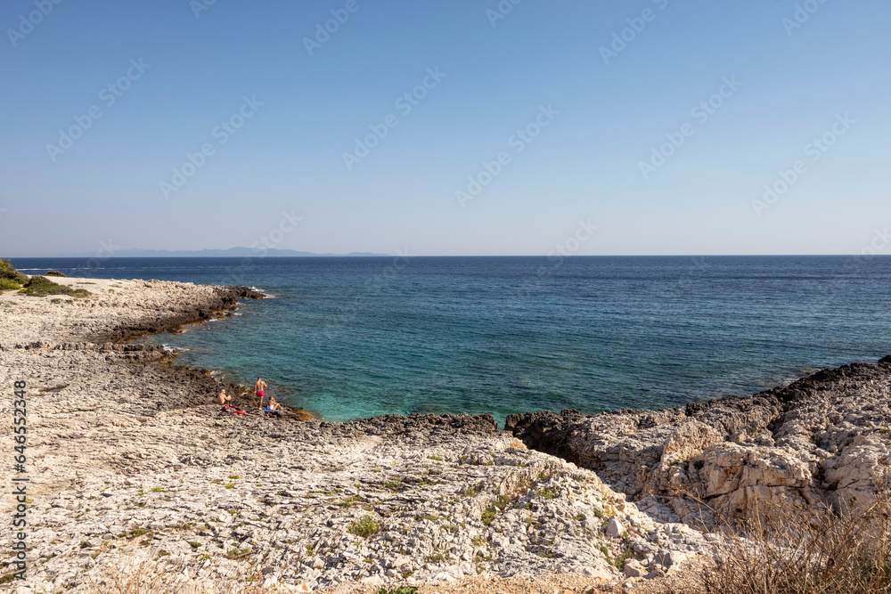 Sharp, spike shaped stone rocks on the isolated cape Raznjic, most eastern point of Korcula island, near town of Lumbarda, Croatia Sharp, spike shaped stone rocks on the isolated cape Raznjic, most eastern point of Korcula island, near town of Lumbarda, Croatia