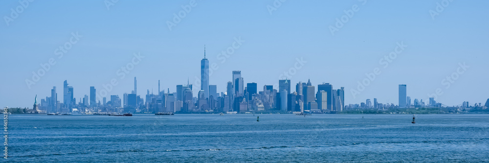 Cityscape of Manhattan, the most densely populated and geographically smallest of the five boroughs of New York City from New York Harbor
