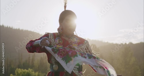 Beautiful Shot of Young Indigenous Woman Fancy Dancing In traditional Regalia