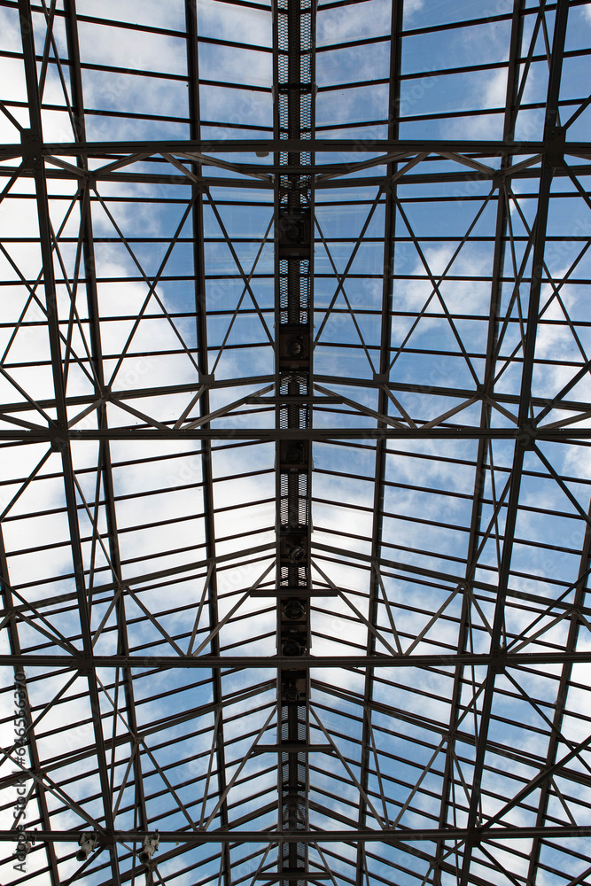 Glass roof and blue sky on background