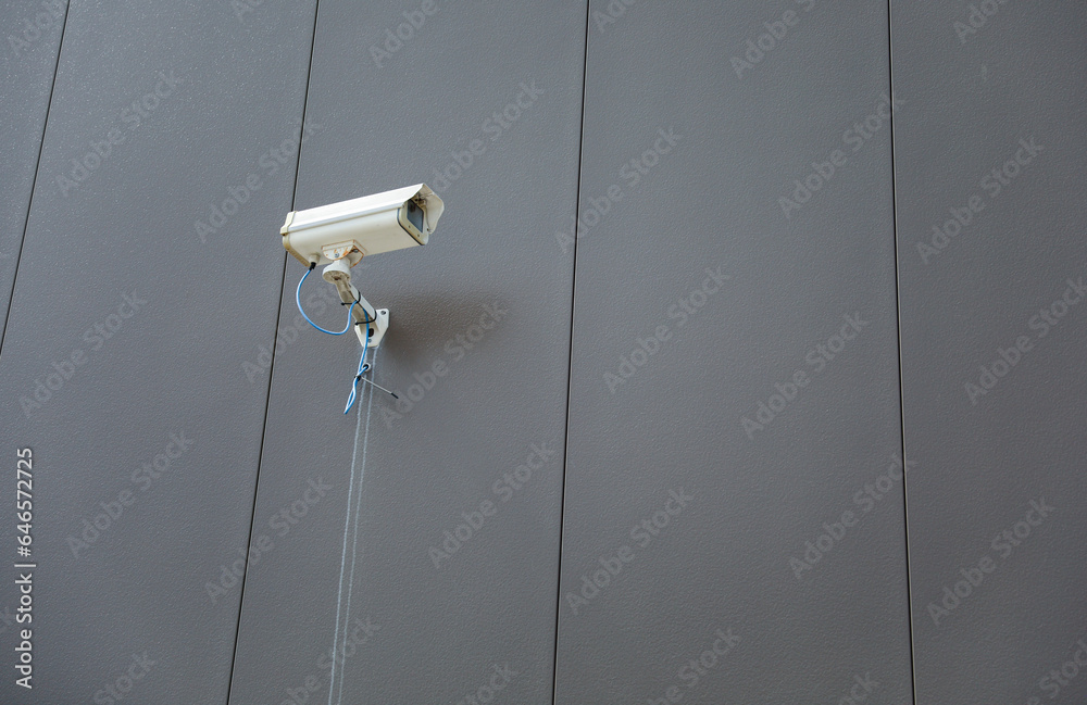 Security camera technology on urban street, ensuring public safety and surveillance Security camera technology on urban street, ensuring public safety and surveillance