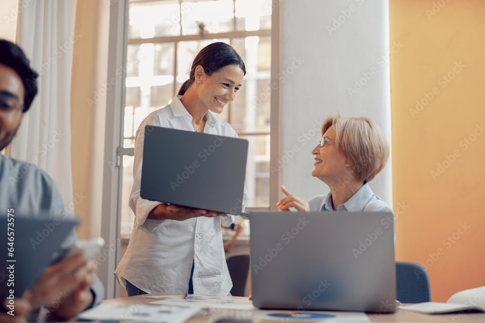 Group of professional business managers working with documents in office and use laptop Group of professional business managers working with documents in office and use laptop