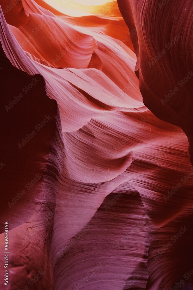 Flowing Striated Rock Formations with Warm Light in Antelope Canyon Flowing Striated Rock Formations with Warm Light in Antelope Canyon