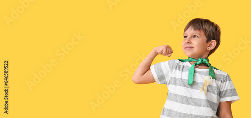 Little boy in superhero cos...