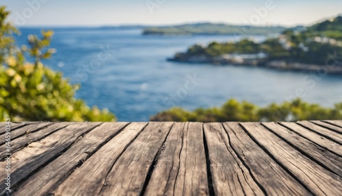 Sea  island  and blue sky background with wooden table in the foreground