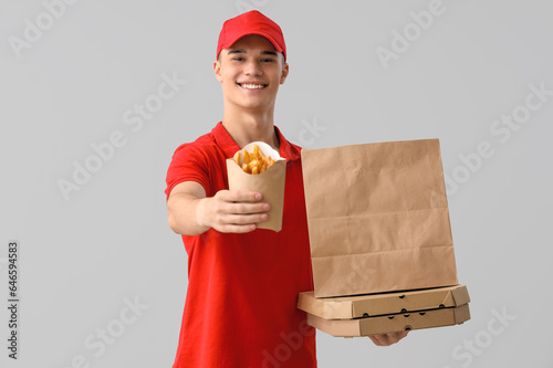 Young delivery man with fre...