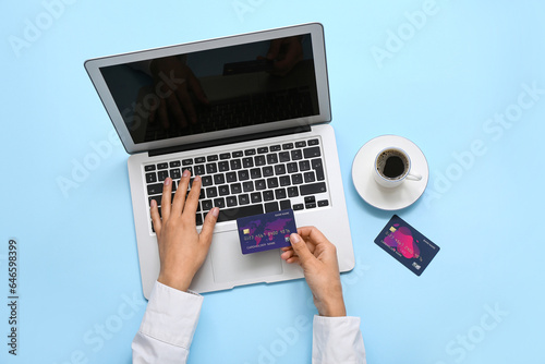 Woman with credit card and ...