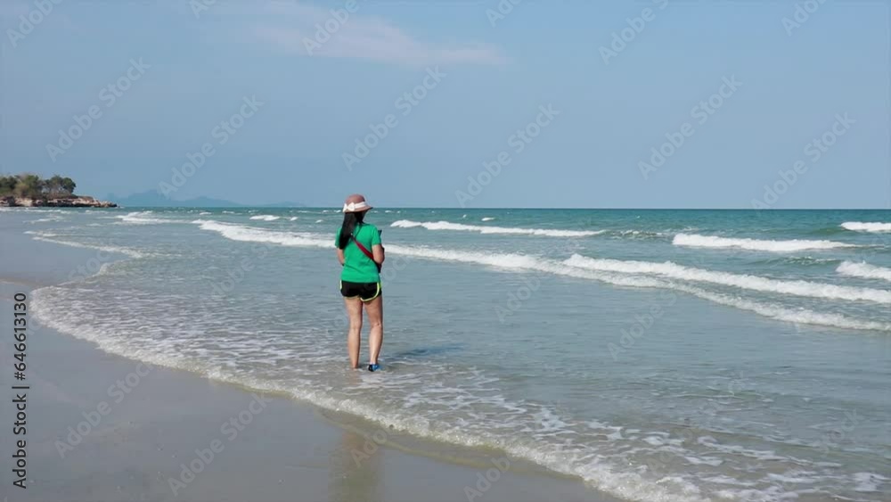 Woman walking relax on the beach Woman walking relax on the beach
