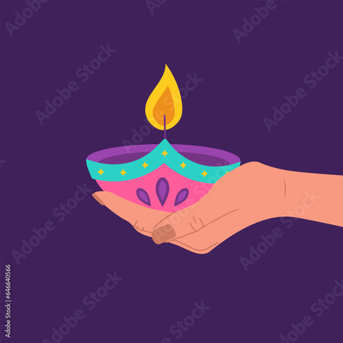 Diwali diya lamp. Female hand holding burning candle. Indian festival of lights icon. Colorful deepavali sign on purple background. Vector illustration in flat cartoon style.