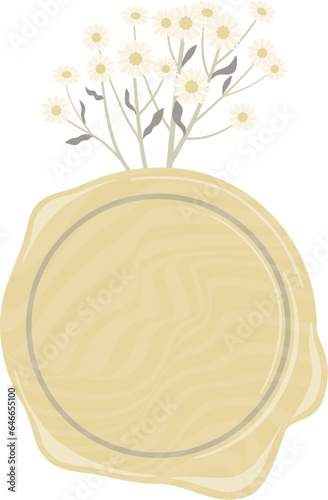 Yellow wax stamp with dried white flowers attached