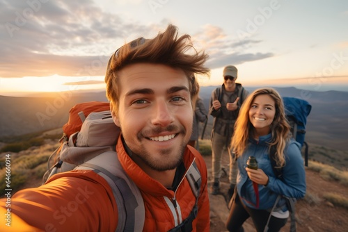 Young hiker man taking selfie portrait on the top of mountain © Nice Seven