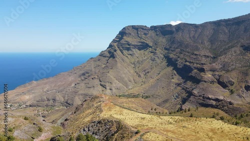 Tamadaba natural park, Tirma: aerial view traveling in a fantastic landscape with high mountains and Roque Faneque in this natural park on the island of Gran Canaria on a sunny day. photo