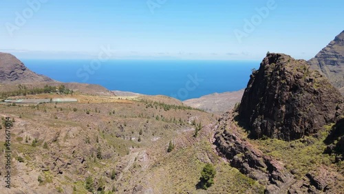 Tamadaba Natural Park, Tirma: aerial view passing near large rock formations in this natural park on the island of Gran Canaria on a sunny day. photo