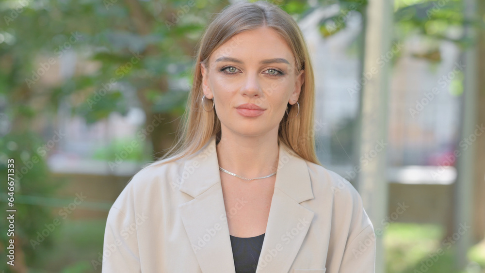 Portrait of Serious Young Businesswoman Outdoor Portrait of Serious Young Businesswoman Outdoor