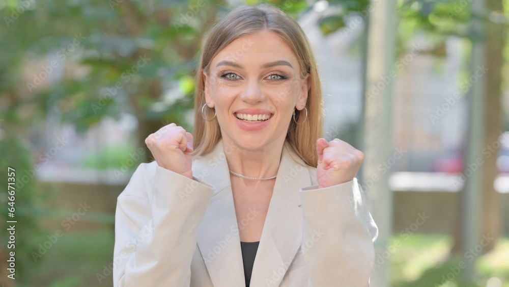 Outdoor Portrait of Businesswoman Celebrating Success Outdoor Portrait of Businesswoman Celebrating Success