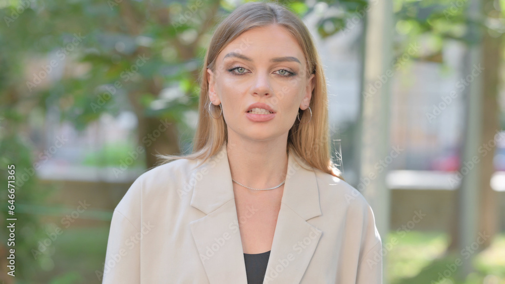 Outdoor Portrait of Stressed Businesswoman Doing Argument Outdoor Portrait of Stressed Businesswoman Doing Argument