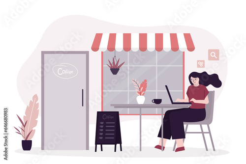 Businesswoman sits at table in street cafe and working on laptop. Morning coffee and work. Smart freelancer sitting in restaurant or coworking. Remote job, modern technology.