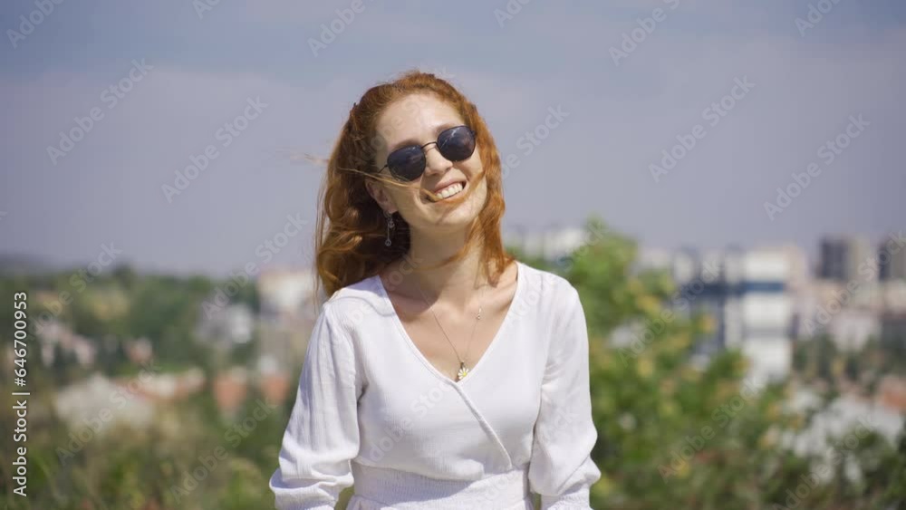 Woman making a happy and peaceful frame sign. Woman making a happy and peaceful frame sign.