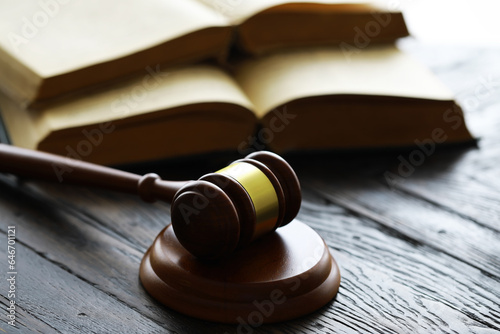 Judges gavel on wooden desk. Law firm concept.