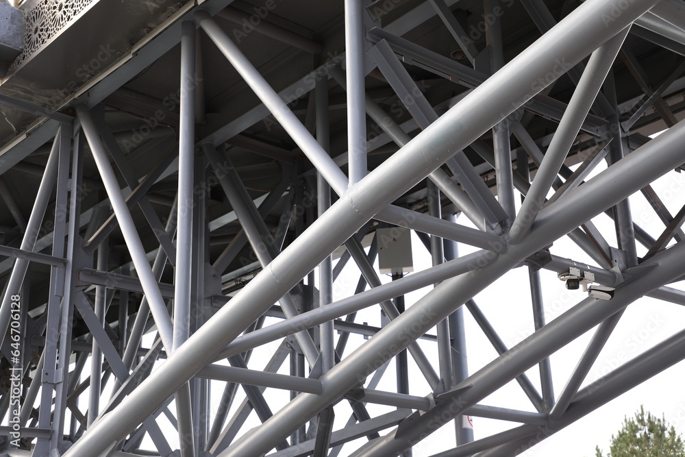 Steel structure of a bridge, close-up, horizontal photo.