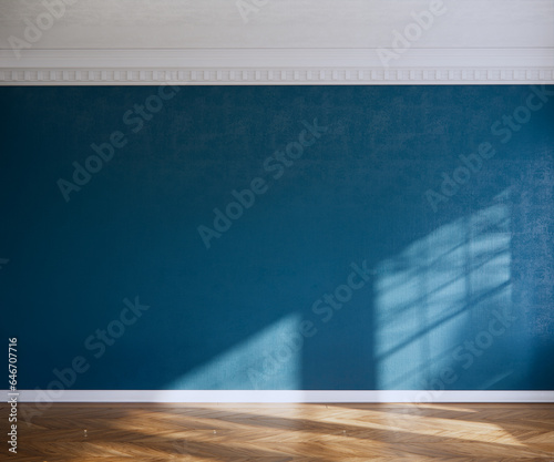 empty room with blue wall, light through window