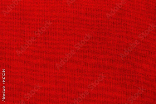 Dark red cotton fabric cloth texture background, seamless pattern of natural textile.