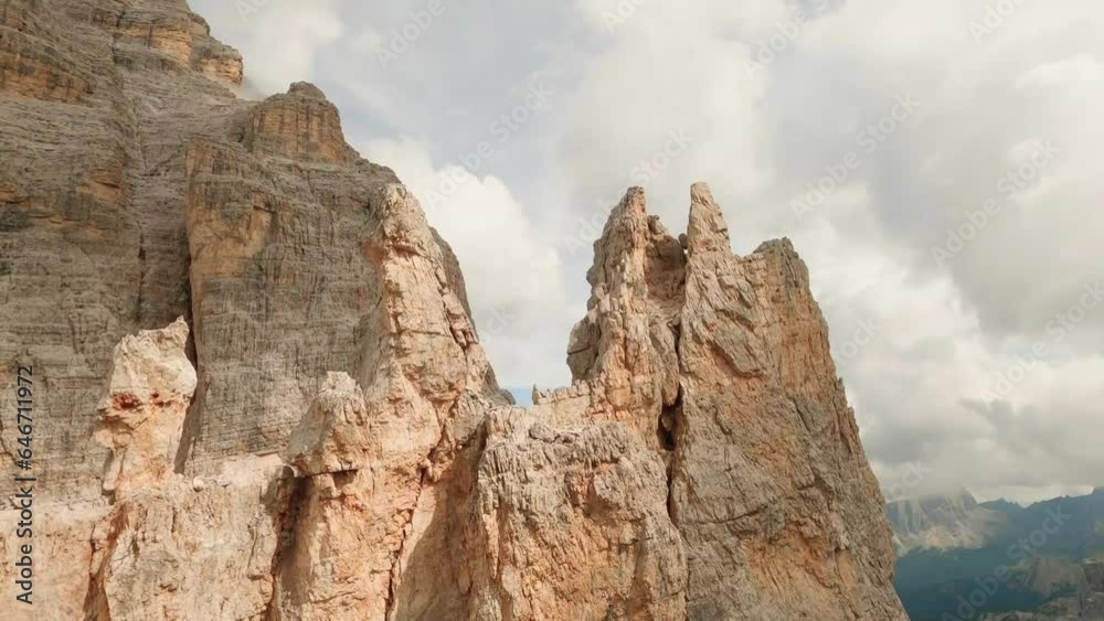 FPV drone gracefully maneuvers around Col De Bos mountain's stunning rock formations, capturing their rugged beauty from unique angles. LuPa Creative. FPV drone gracefully maneuvers around Col De Bos mountain's stunning rock formations, capturing their rugged beauty from unique angles. LuPa Creative.
