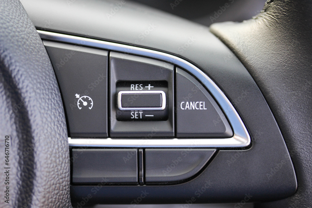 Cruise control buttons in a budget vehicle