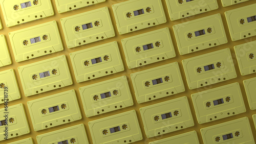 3d rendering. Minimal creative background for retro technology concept. Yellow pastel cassette tape on yellow pastel background.  SHOTLIST1990.