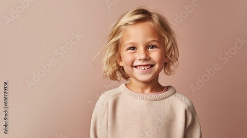 Portrait of a gleeful blonde child, wearing neutral attire, smiling against a studio's light beige backdrop. Generative AI