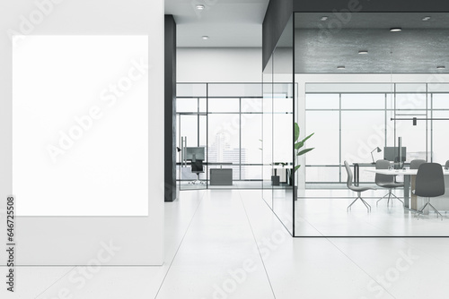 Modern meeting room interior with white mock up banner on wall, furniture, window with city view, glass partitions and other objects. 3D Rendering.