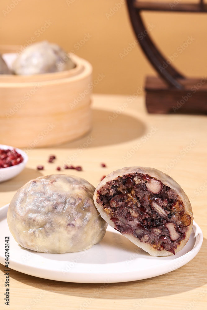 Chinese bean buns made from cereals and grains (purple sweet potato, black rice, red beans, red dates, peanuts), traditional Chinese snacks, healthy breakfast
