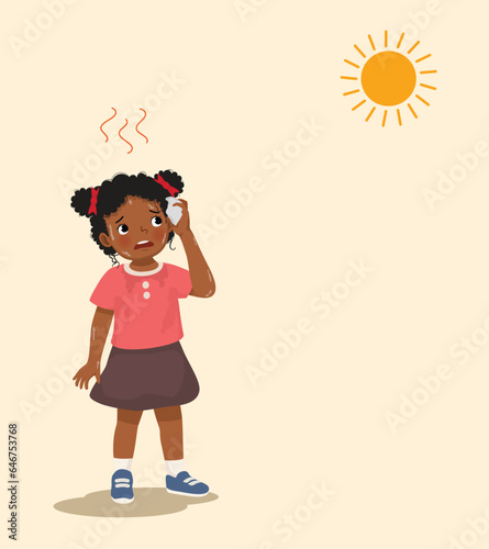 Cute little African girl sweating suffering from heat stroke under very hot sunny day