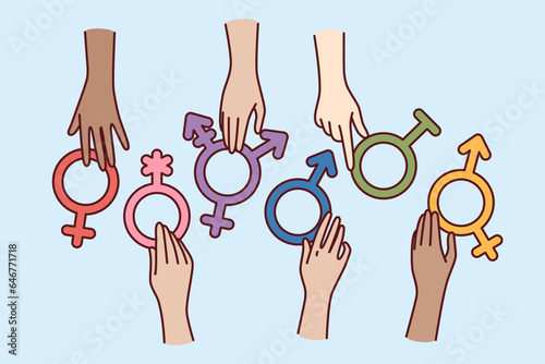 Symbols different genders in hands, for concept absence of discrimination against transgender humans. Banner to call for tolerance towards people who have undergone genders reassignment surgery