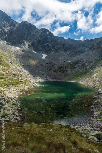 Zamrznute pleso lake in highest part of Bielovodska dolina valley in High Tatras mountains in Slovakia