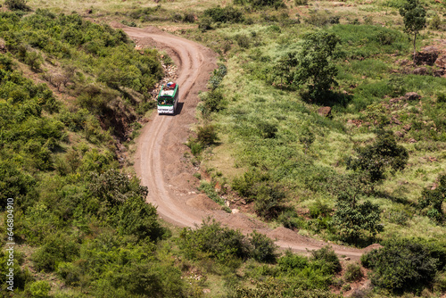 Local bus on a rural road near Arba Minch, Ethiopia photo