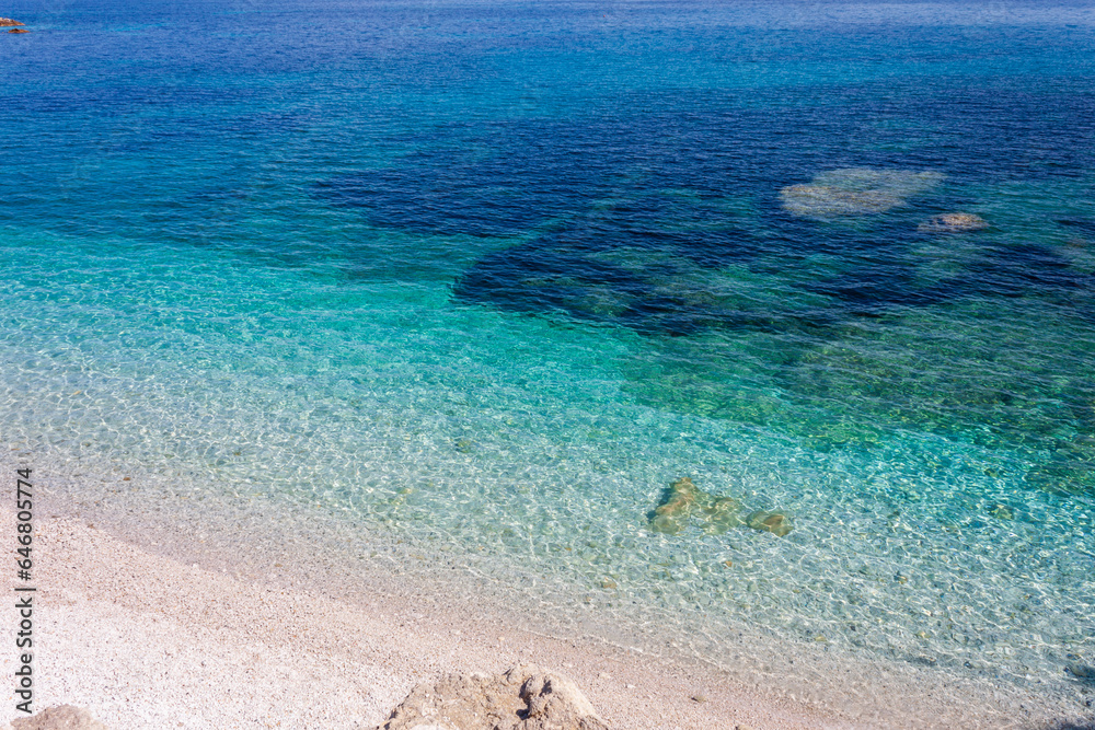 Obraz premium Capo Bianco beach, on the elba island, seen from the drone. Isola d'Elba, italy, a beautiful Island.