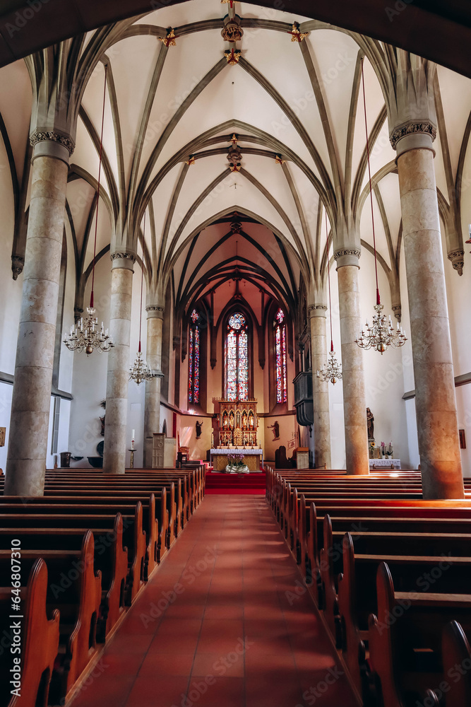 Fototapeta premium Vaduz, Liechtenstein - August 11, 2023: Vaduz Cathedral, or Cathedral of St. Florin, a neo-Gothic church in Vaduz, Liechtenstein, and the centre of the Roman Catholic Archdiocese of Vaduz.