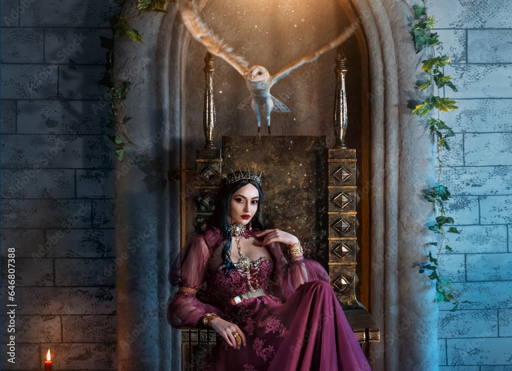 Art photo real people fantasy woman evil elven queen sits on throne, dark magic purple long dress Sexy face witch elf girl. Gothic vampire princess, crown. Barn owl fly flaps wings. halloween costume