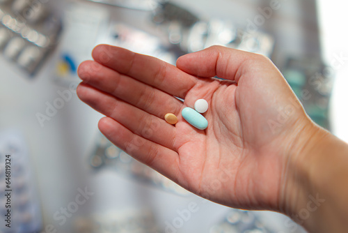 pills in hand.many pills.illness and treatment.colds and flu.taking medications.vitamins and minerals for health.health supplements.health problems.antidepressants.pharmaceuticals.medicine for health.