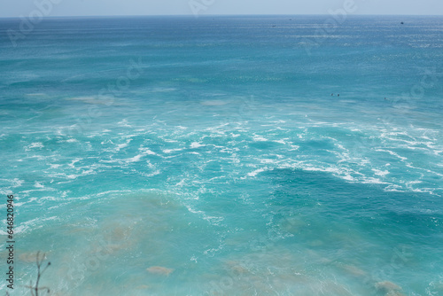 Aerial photography of the beautiful blue waves of the Indian Ocean