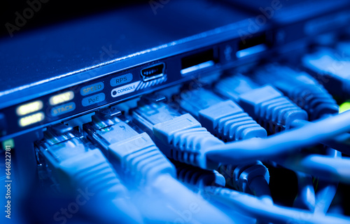 Ethernet switch in server room with cables
