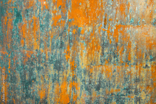 Old cracked paint in craquelure on a rusty metal surfaceGrunge rusted metal texture. Rusty corrosion and oxidized background. Worn metallic iron rusty metal background. 