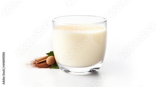 Image of homemade delicious eggnog with cinnamon in glass isolated on white backgrounds