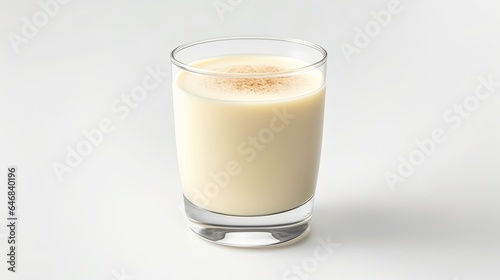 Image of homemade delicious eggnog with cinnamon in glass isolated on white backgrounds
