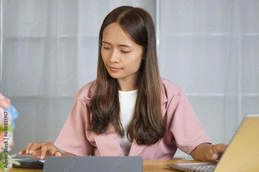 Business woman working happily from more profits On target Business woman working happily from more profits On target
