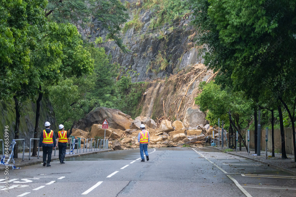 2023 Sept 9,Hong Kong.Landslide scene after heavy rain, with mud blocking the entire road , Yiu Hing Road, Yiu Tung Estate, Shau Kei Wan.